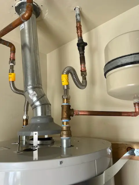 Water heater installation and plumbing repair in Shelby Forest
